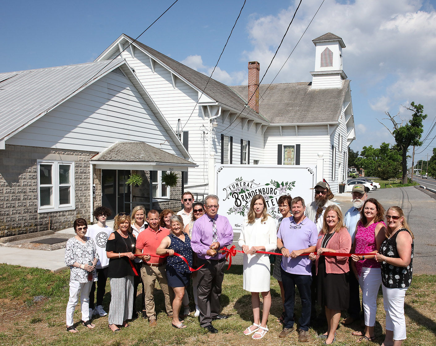 Ribbon cutting at new funeral parlor opening